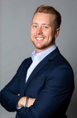 Ryan_Headshot_Crossarm_Side_Smile_BEST Ryan_Headshot_Crossarm_Side_Smile_BEST